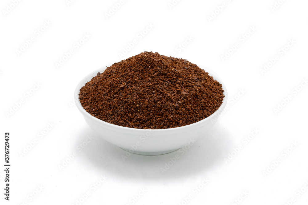 Porcelain bowl with ground coffee. Porcelain bowl with ground coffee.
