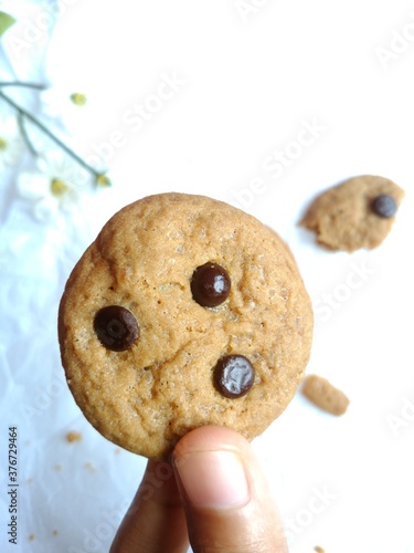 brown soft cookies with chocochips topping. cookies on the white background