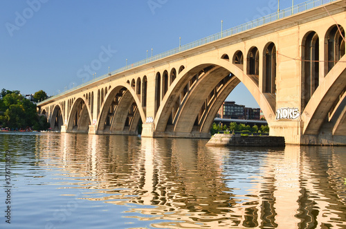Francis Scott Key Memorial Bridge and its reflection over Potomac River in Washington D.C. United States of America 