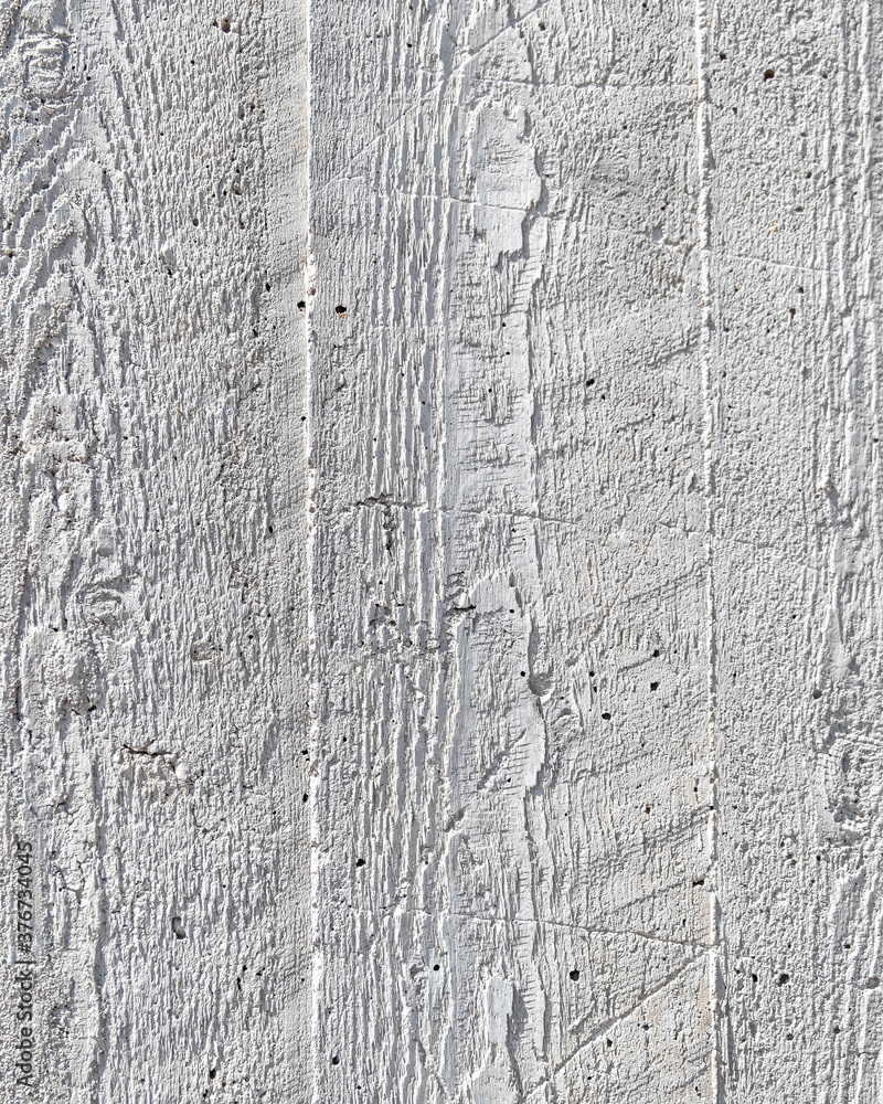 Fototapeta premium grey concrete wall closeup with wooden planks pattern imprint, seamless background