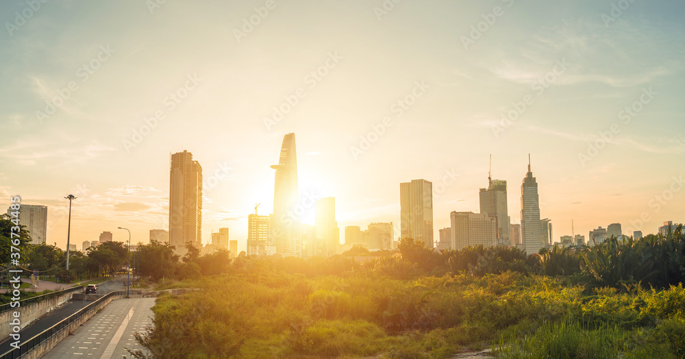 Beautiful landscape sunset of Ho Chi Minh city or Sai Gon, Vietnam. Bitexco Financial Tower and skyscraper buildings. Business and landscape concept.
