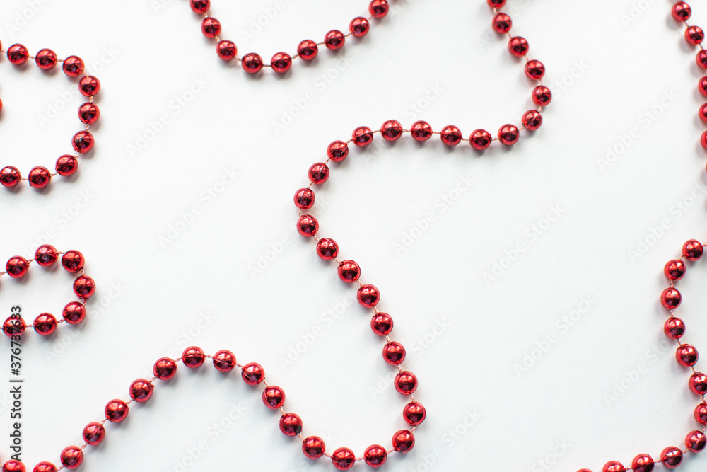 Christmas toys and garlands on a white background Christmas toys and garlands on a white background
