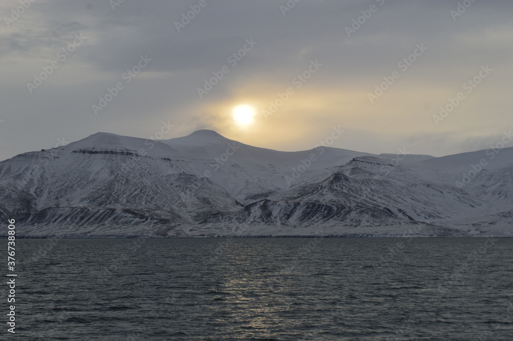Winter sunset in the ice fjords of the Norwegian Archipelago of Svalbard (Spitsbergen), Norway
