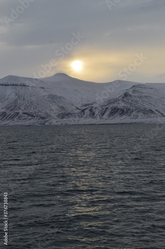 Winter sunset in the ice fjords of the Norwegian Archipelago of Svalbard (Spitsbergen), Norway