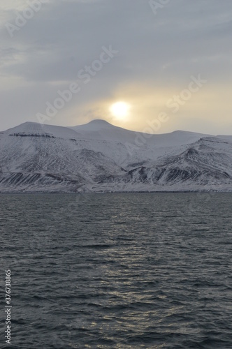 Winter sunset in the ice fjords of the Norwegian Archipelago of Svalbard (Spitsbergen), Norway