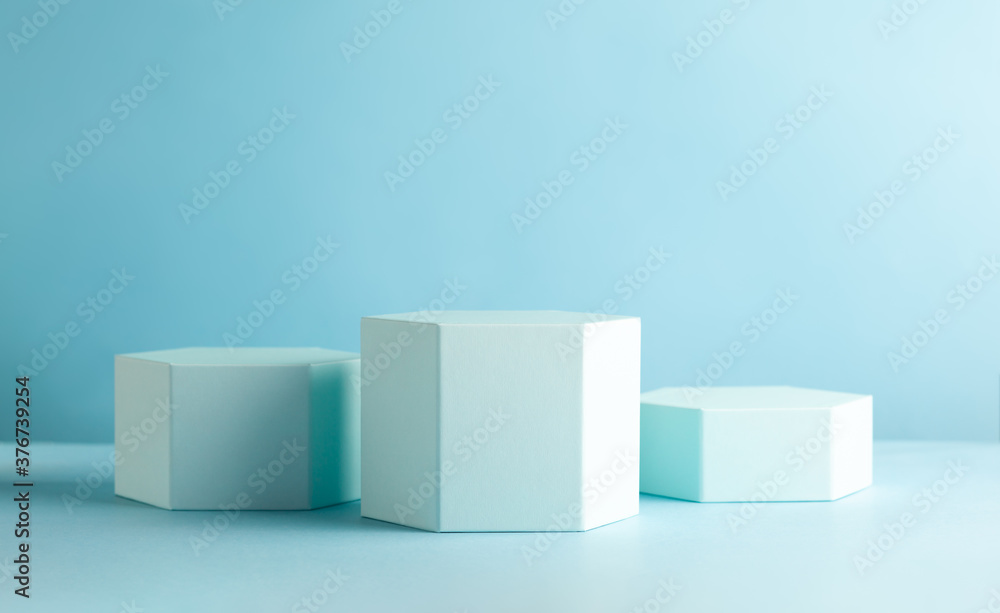 Abstract background with hexagon shape podiums for products presentation or exhibitions. Composition of different geometric objects Abstract background with hexagon shape podiums for products presentation or exhibitions. Composition of different geometric objects