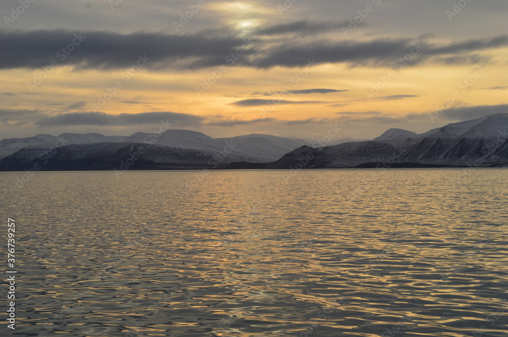 Winter sunset in the ice fjords of the Norwegian Archipelago of Svalbard (Spitsbergen), Norway