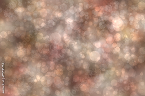 Abstract festive brown gradient gray silver pastel bokeh background texture with colorful circles and bokeh lights. Beautiful backdrop.