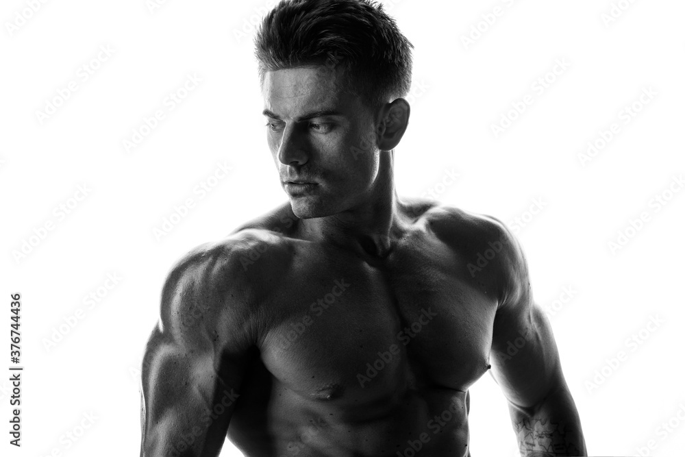 Fototapeta premium abdominal, adult, arm, athletic, attractive, beautiful, biceps, big, body, bodybuilder, bodybuilding, chest, concept, face, fit, fitness, gym, handsome, healthy, heavy, isolated, lifestyle, light, loo