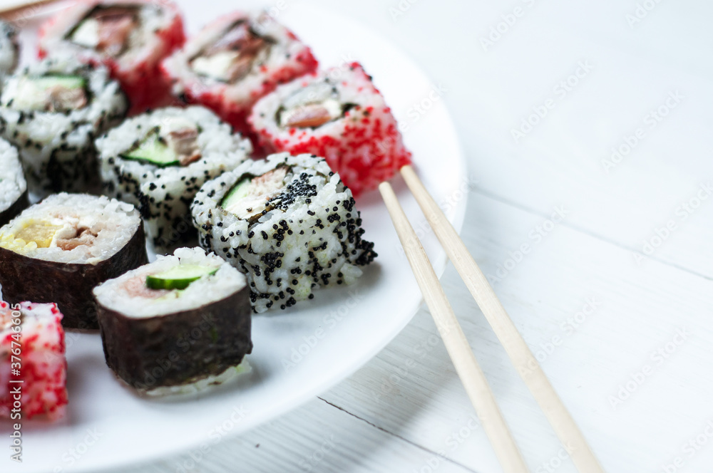 Sushi traditional dish of the Japanese kitchen Sushi traditional dish of the Japanese kitchen