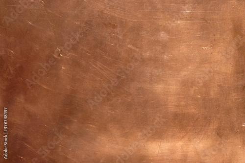 Copper surface with sunlight. Copy space. Minimalism. photo