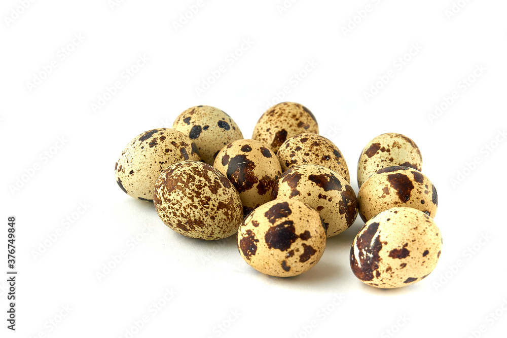 Group of quail eggs on white