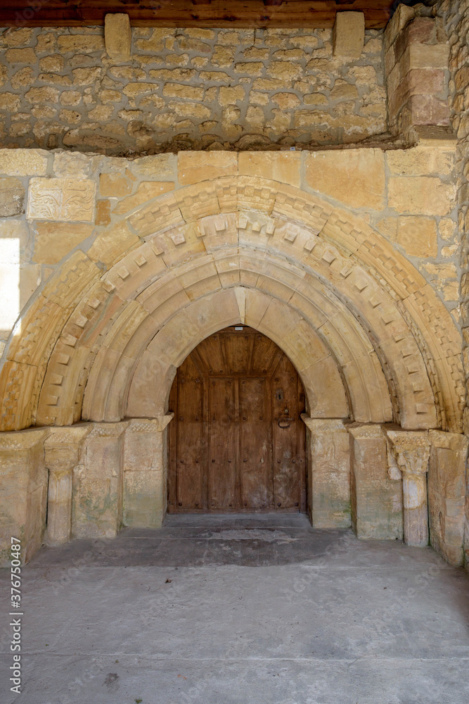 Door of the Hoyos del Tozo church, with Romanesque elements, in Burgos, Castilla y Leon, Spain