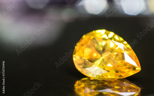 Natural yellow Sapphire gemstone, beautiful yellow gold citrin gemstone isolated on white background, as jewelry background