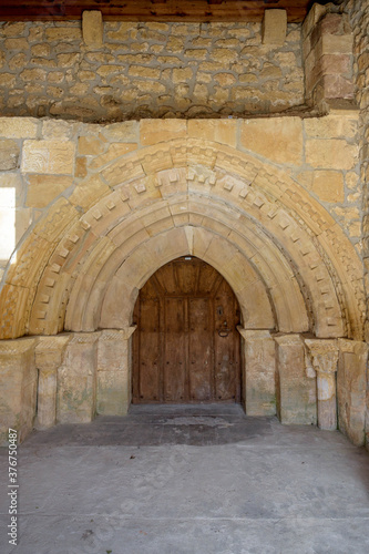 Door of the Hoyos del Tozo church, with Romanesque elements, in Burgos, Castilla y Leon, Spain © David Paniagua
