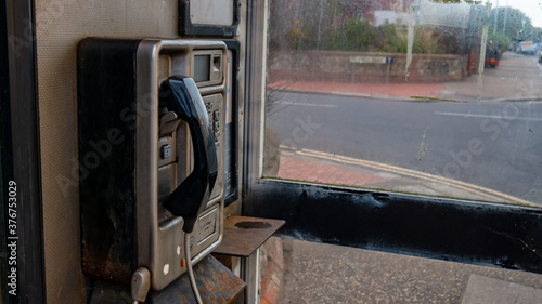 Old unused phone bos in the evening time 