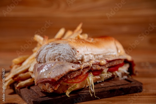 Meat sandwich with wood backgound