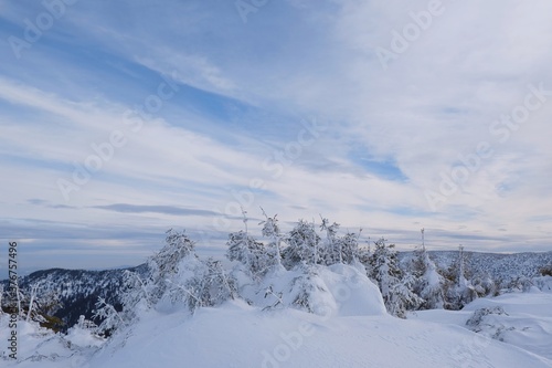 Beautiful winter mountain views during a snowshoe hike along the red ridge trail around Kosarisko in the Low Tatras © Iwona