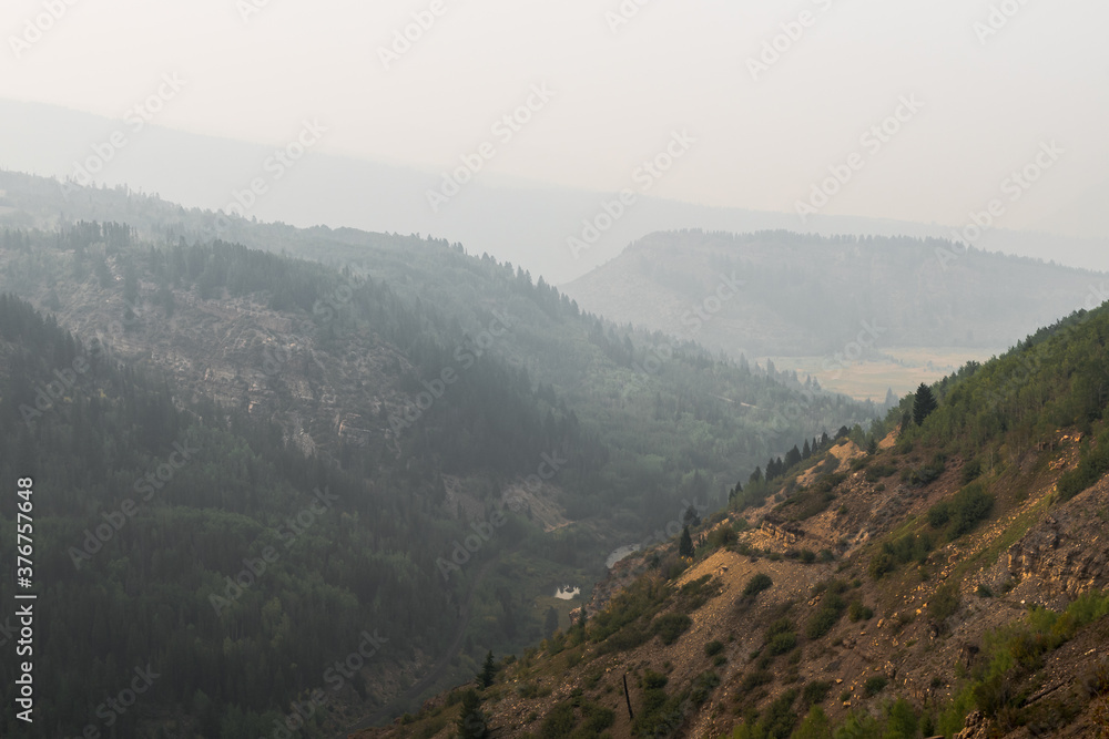 Smoke filled mountains in Colorado during wildfire season. Smoke filled mountains in Colorado during wildfire season.