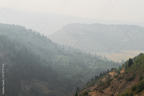 Smoke filled mountains in Colorado during wildfire season.  photo