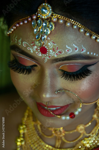 a girl in her marriage day showing her eye makeup