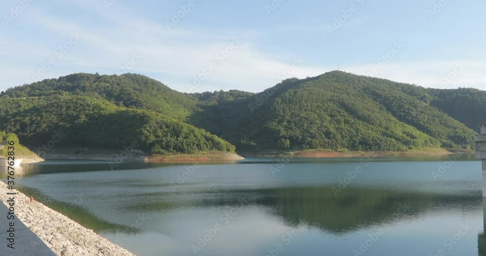 Video of a mountain lake showing mountains with forests. Beautiful background landscape video in Serbia. Video of a mountain lake showing mountains with forests. Beautiful background landscape video in Serbia.