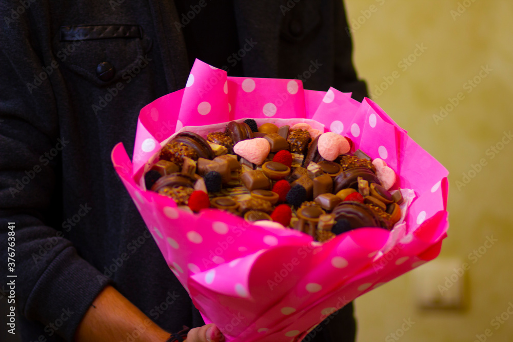 Φωτογραφία Beautiful original sweet bouquet of sweets, chocolate and cookies for the holida