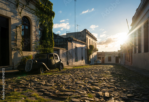 Vintage car parked on cobbled street, Barrio Historico (Old Quarter), Colonia del Sacramento, Colonia, Uruguay photo