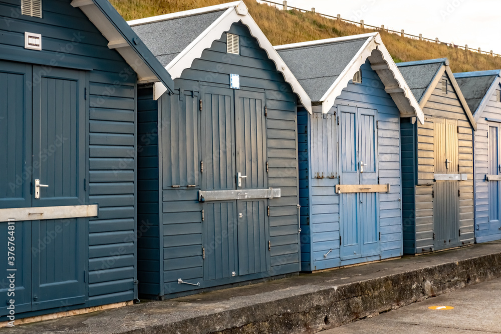 Row of beach huts along Sheringham beach