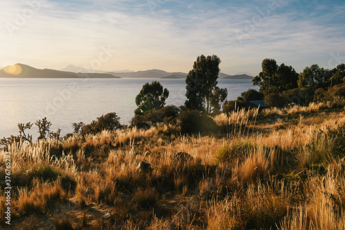 View of Lake Titicaca at dawn, Anapia, Peru, South America photo