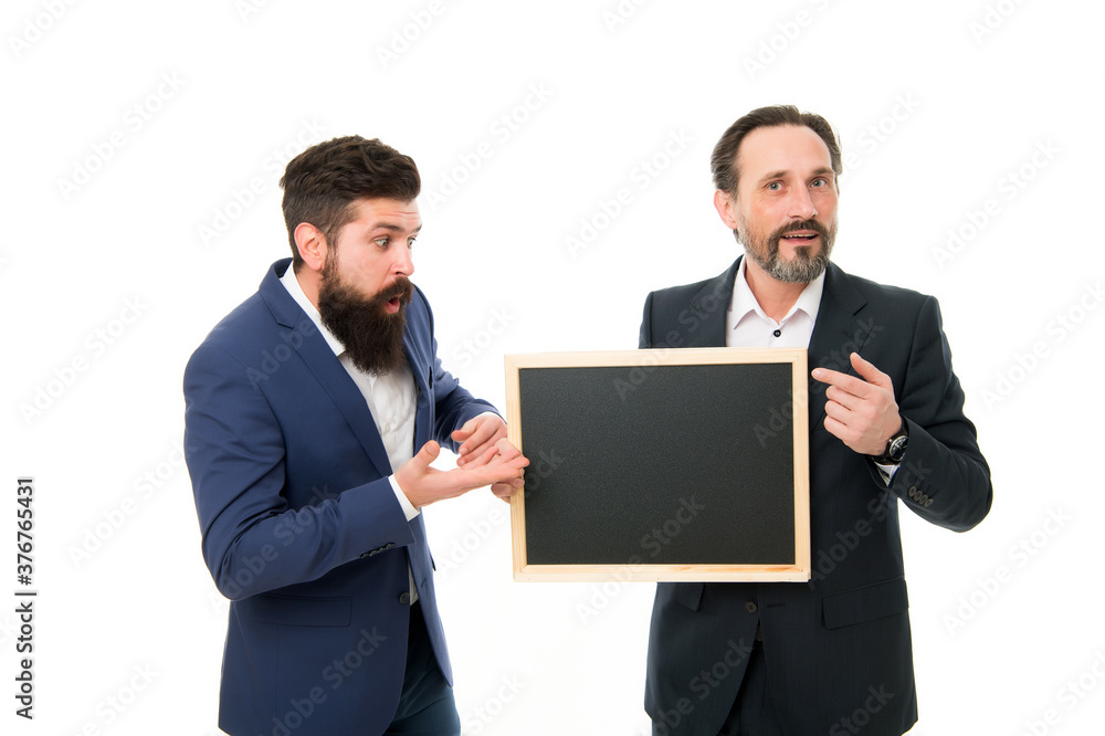 OMG. Businessmen got shocking information. School teachers hold blackboard. Private teaching. Teaching business. Training and teaching methods. Teaching and pedagogy. Education, copy space OMG. Businessmen got shocking information. School teachers hold blackboard. Private teaching. Teaching business. Training and teaching methods. Teaching and pedagogy. Education, copy space