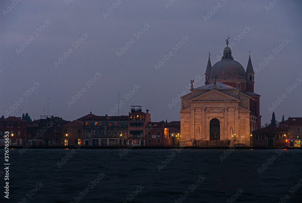 Night cityscape of Venice with Redentore church