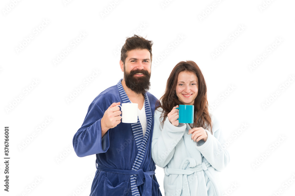 good morning coffee. happy family drink tea. couple in love wear bathrobe. family day at home. Couple enjoy lazy weekend and drink coffee. man and woman need relax and energy. everyday routine good morning coffee. happy family drink tea. couple in love wear bathrobe. family day at home. Couple enjoy lazy weekend and drink coffee. man and woman need relax and energy. everyday routine