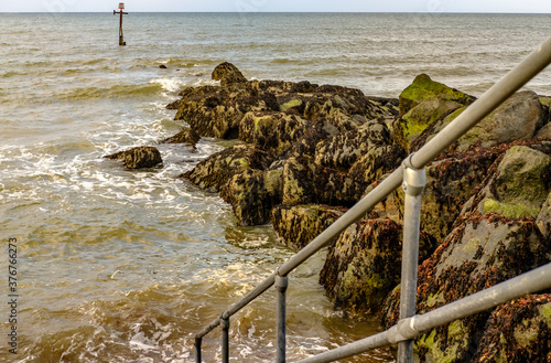 The steps down to Sheringham beach at high water