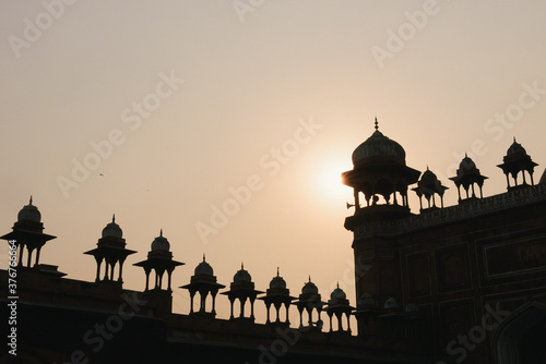 Silhouetted view of Jama Masjid, Agra, Uttar Pradesh, India photo