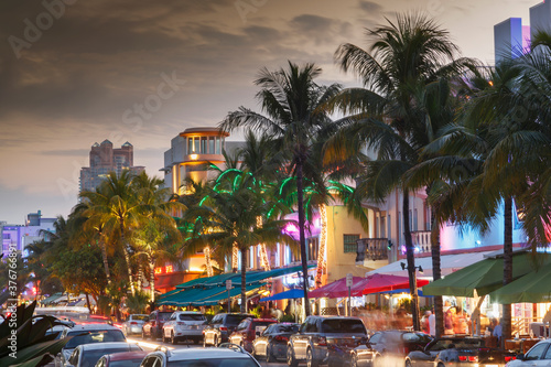 Pastel color buildings on Ocean Drive, in the famous Art Deco District in South Beach, at dusk, Miami Beach, Florida, USA © Image Source