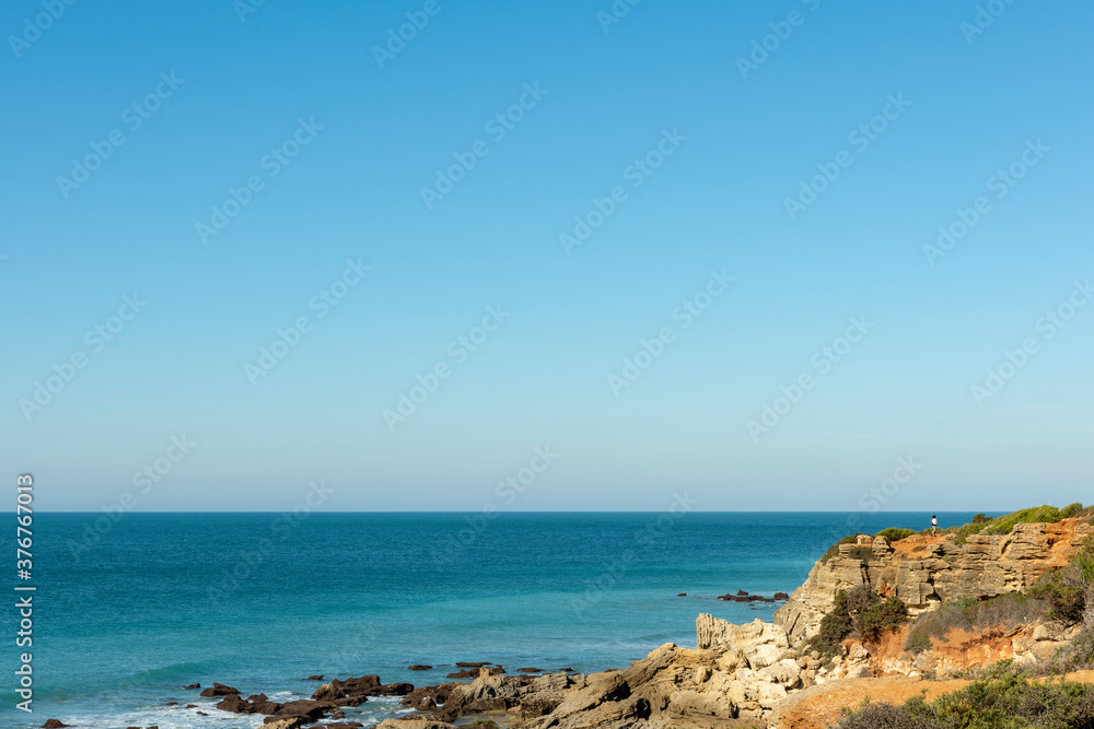 Acantilado de la playa de Cabo de Roche, ubicado en Conil de la Frontera, en la provincia de Cadiz, España. Acantilado de la playa de Cabo de Roche, ubicado en Conil de la Frontera, en la provincia de Cadiz, España.