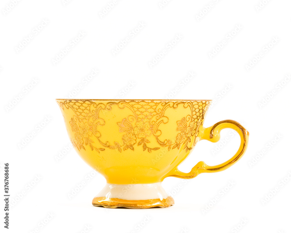 Ταπετσαρία Single brightly coloured vintage tea cup with elegant floral design in gold