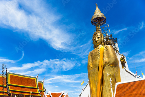 Standing Buddha, Wat Intharawihan, Bangkok, Thailand photo