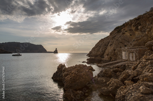 Sunset at Benirras Beach, Ibiza, Spain photo