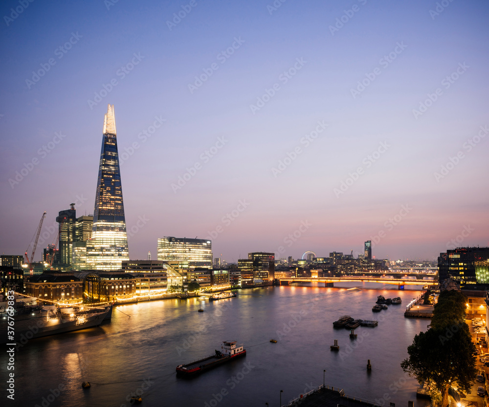 High angle view of Thames river and The Shard building at night, London, UK High angle view of Thames river and The Shard building at night, London, UK