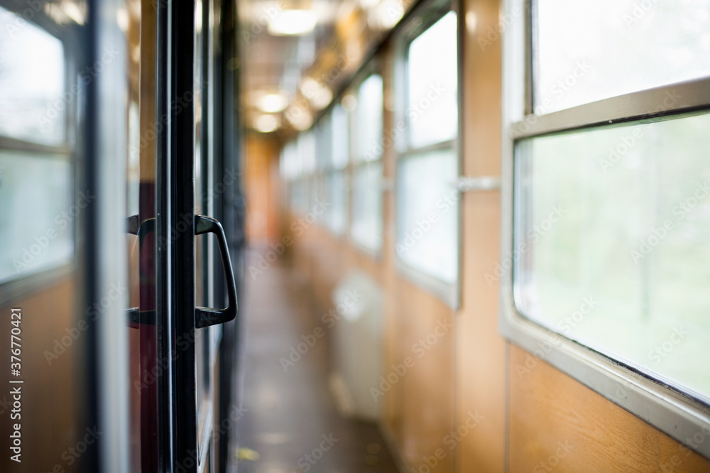 Diminishing perspective of train carriage passageway Diminishing perspective of train carriage passageway