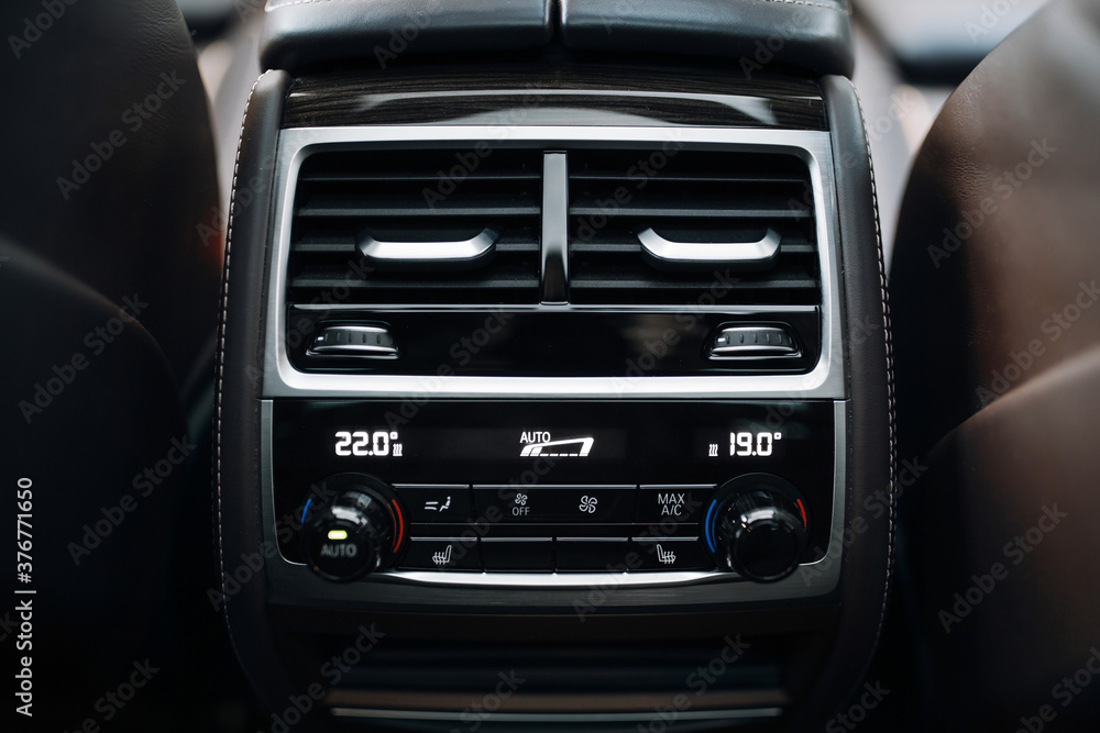 Fototapeta premium Car rear seats row air conditioning control system