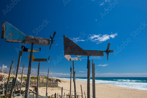 Worn wind vanes on beach, Comporta, Setubal, Portugal photo