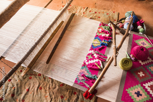 Rug being made on weaving machine, Jodhpur, Rajasthan, India photo