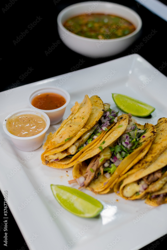 birria tacos, typical street food from Mexico birria tacos, typical street food from Mexico
