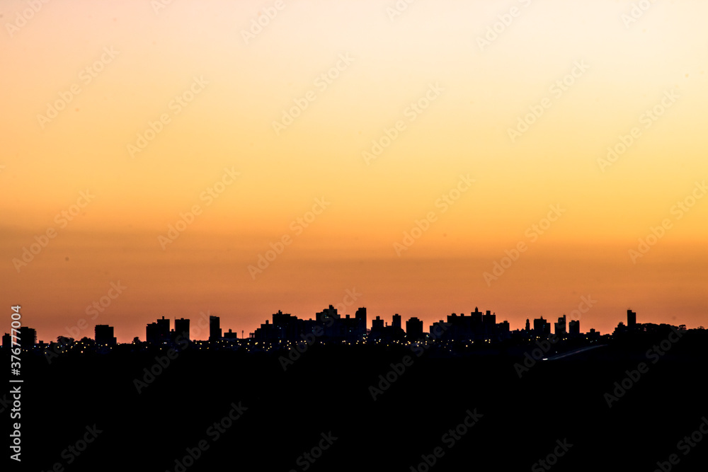 Silhouette of cityscaper buildings during a sunset in Brazil