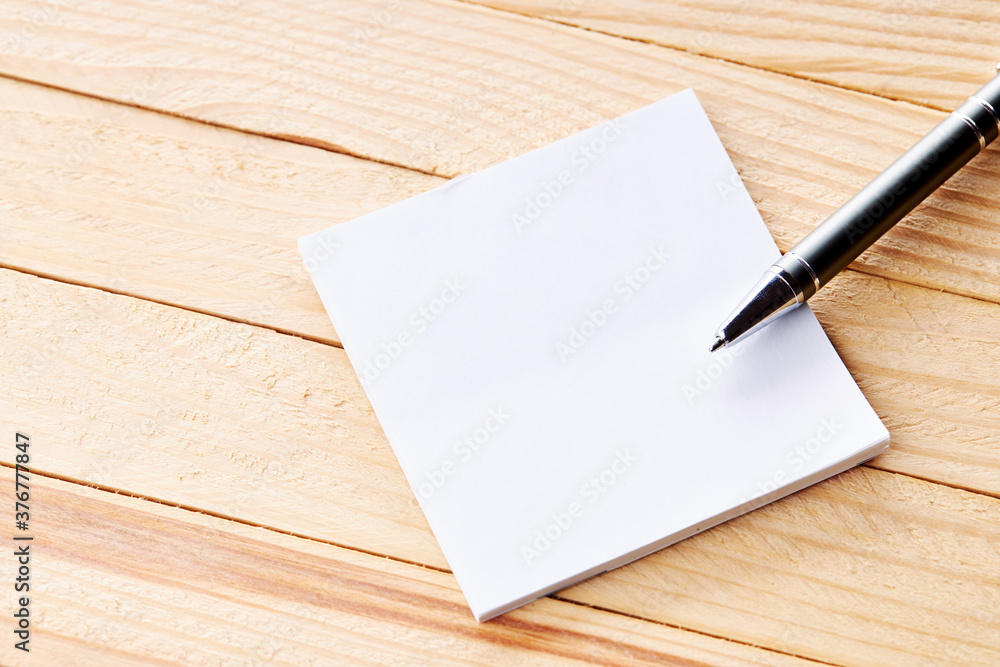 office workplace with blank sticky note. above view. wooden desk. background backdrop office workplace with blank sticky note. above view. wooden desk. background backdrop