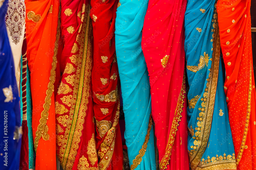 Close up of colourful and decorated Indian dresses