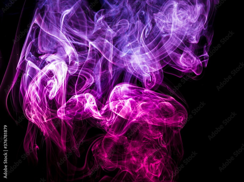 Obraz premium Colored smoke on black background